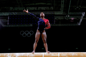 RIO DE JANEIRO, BRAZIL - AUGUST 07: Simone Biles of the United States competes on the balance beam during Women's qualification for Artistic Gymnastics on Day 2 of the Rio 2016 Olympic Games at the Rio Olympic Arena on August 7, 2016 in Rio de Janeiro, Brazil (Photo by Tom Pennington/Getty Images)
